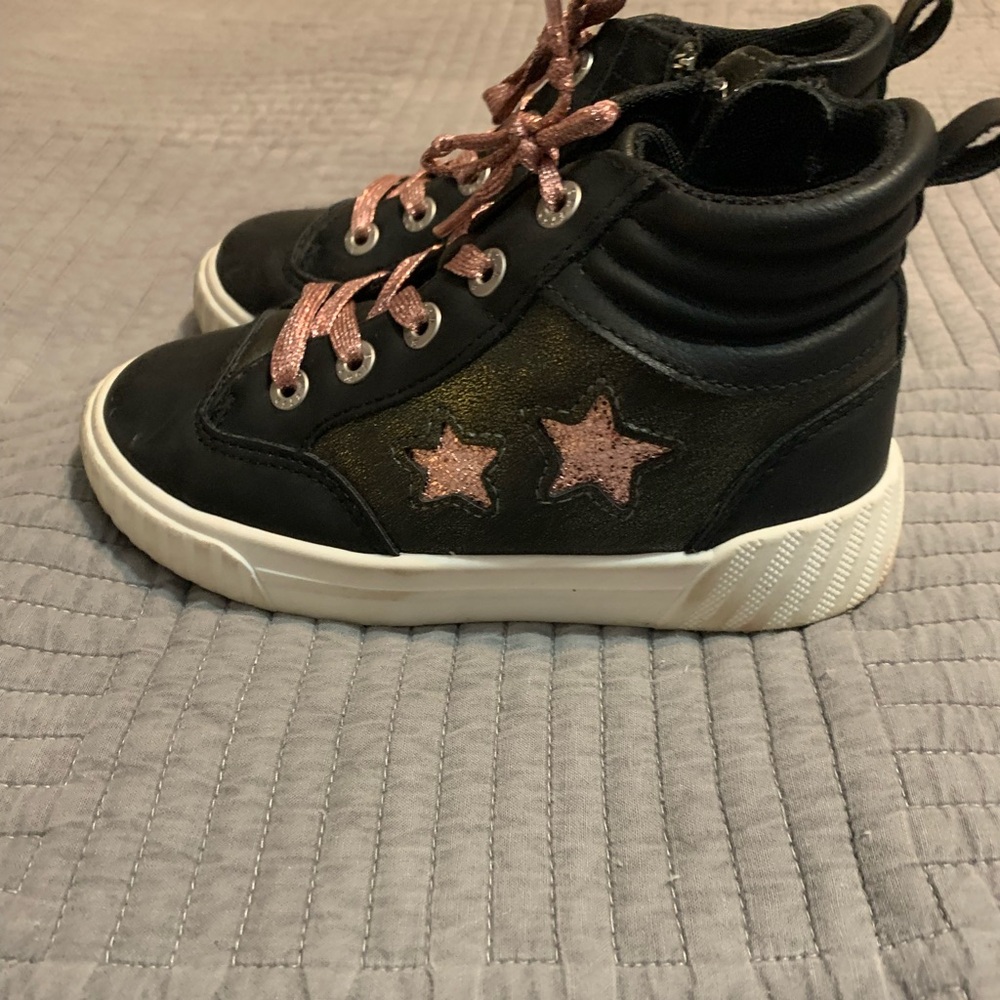 Little girls hi-top sneakers.